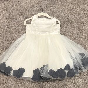 David's Bridal Ivory Flower Girl Dress with Black Petals in tulle - 2t